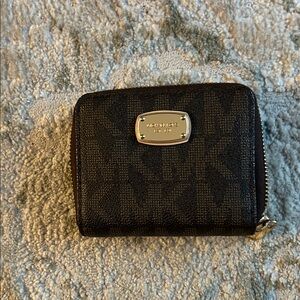 Michael Kors brown monogram zip around wallet